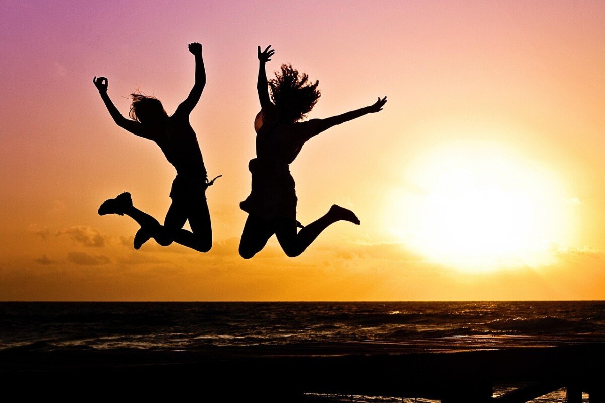 new year background, sunset, beach, silhouettes, jump, jumping, nature, youth, active, happy, pair, girls, young women, people, joy, freedom, seaside, dusk